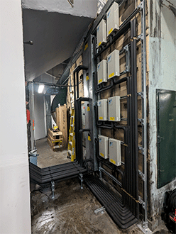 Photo of air-cooled VRV systems inside the existing building ductwork.