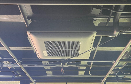 Image of a Daikin Ceiling Cassette unit on ceiling.